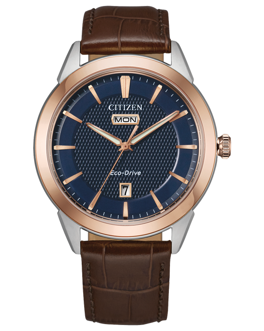 Citizen watch with rose gold and navy dial date tracker and leather band model AW0096-06L